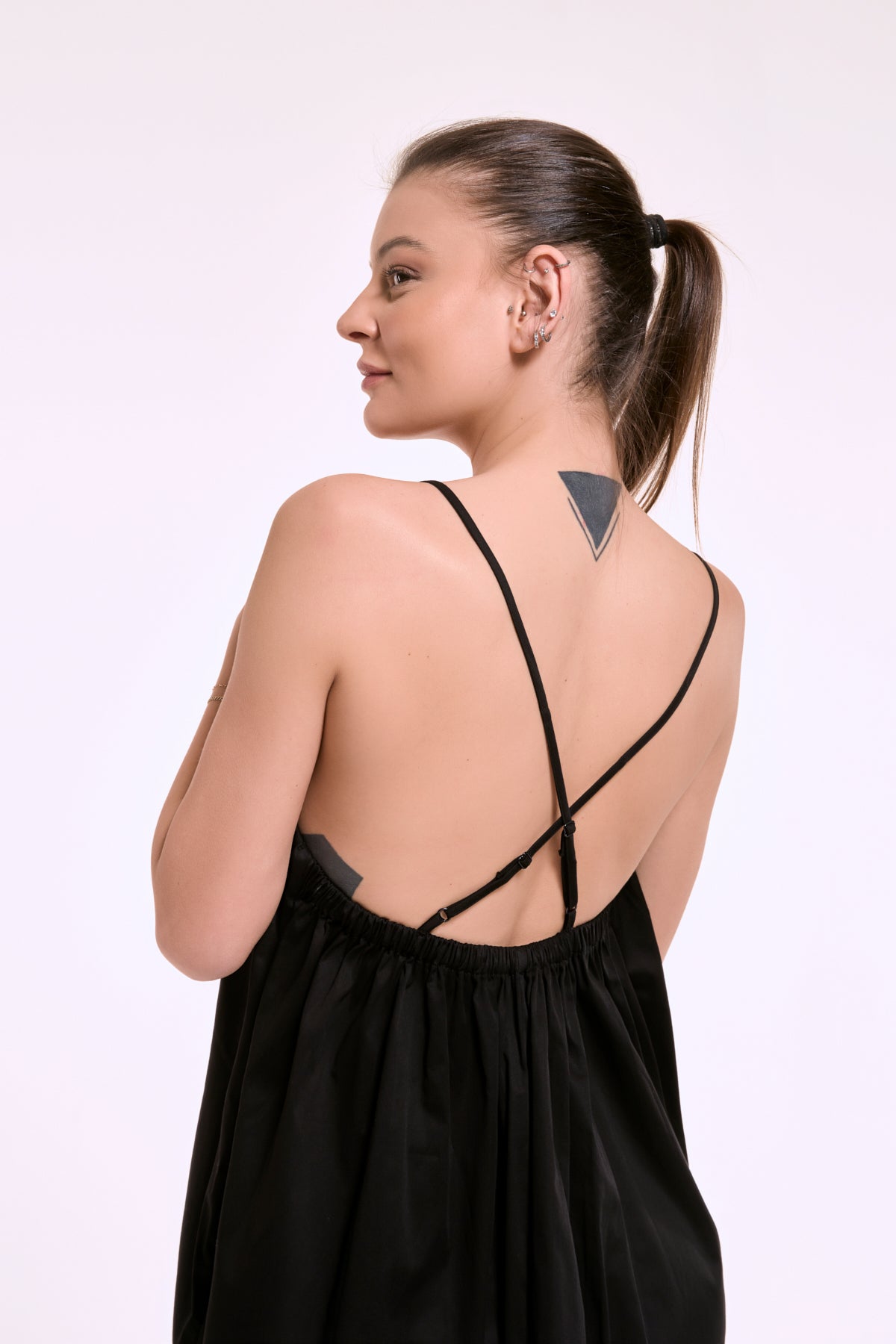 Back detail of Daisy black dress with adjustable cross straps