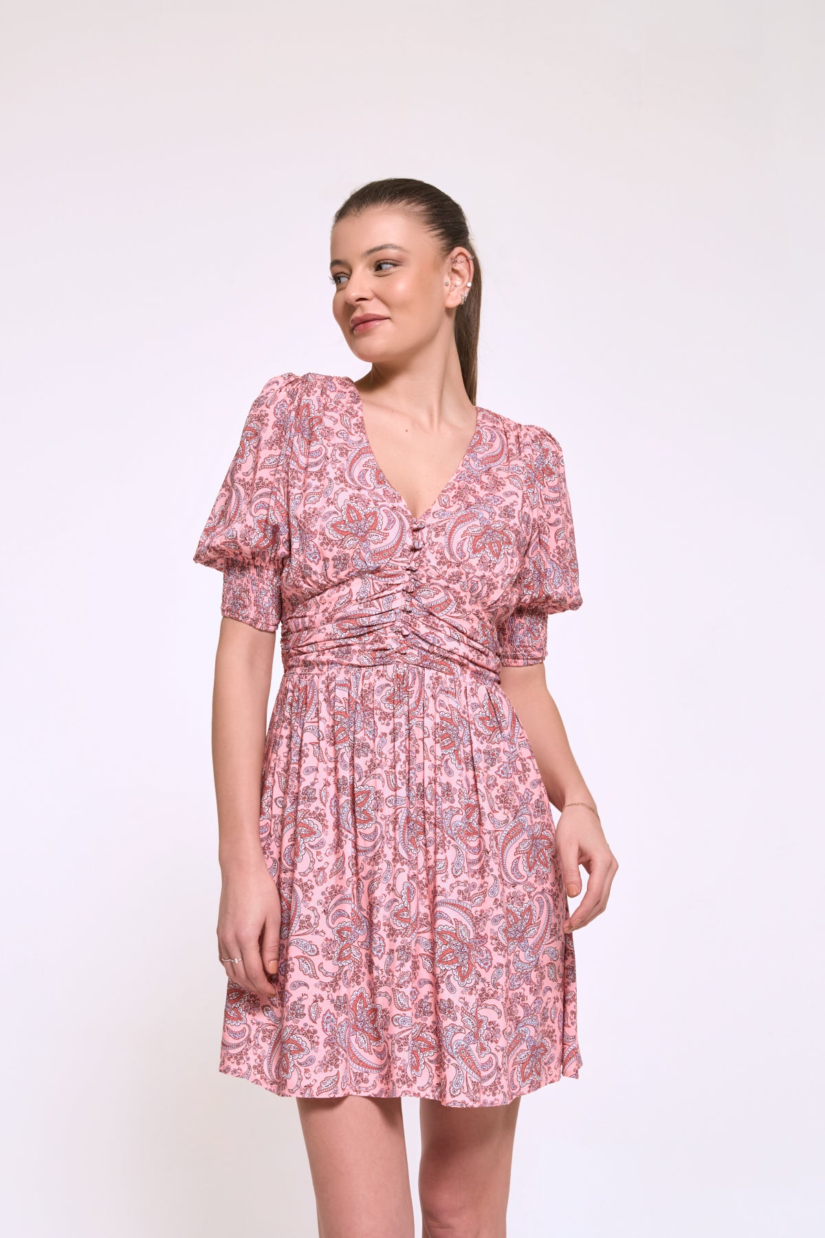 Donna V neck summer dress designed to enhance the natural shape of the body