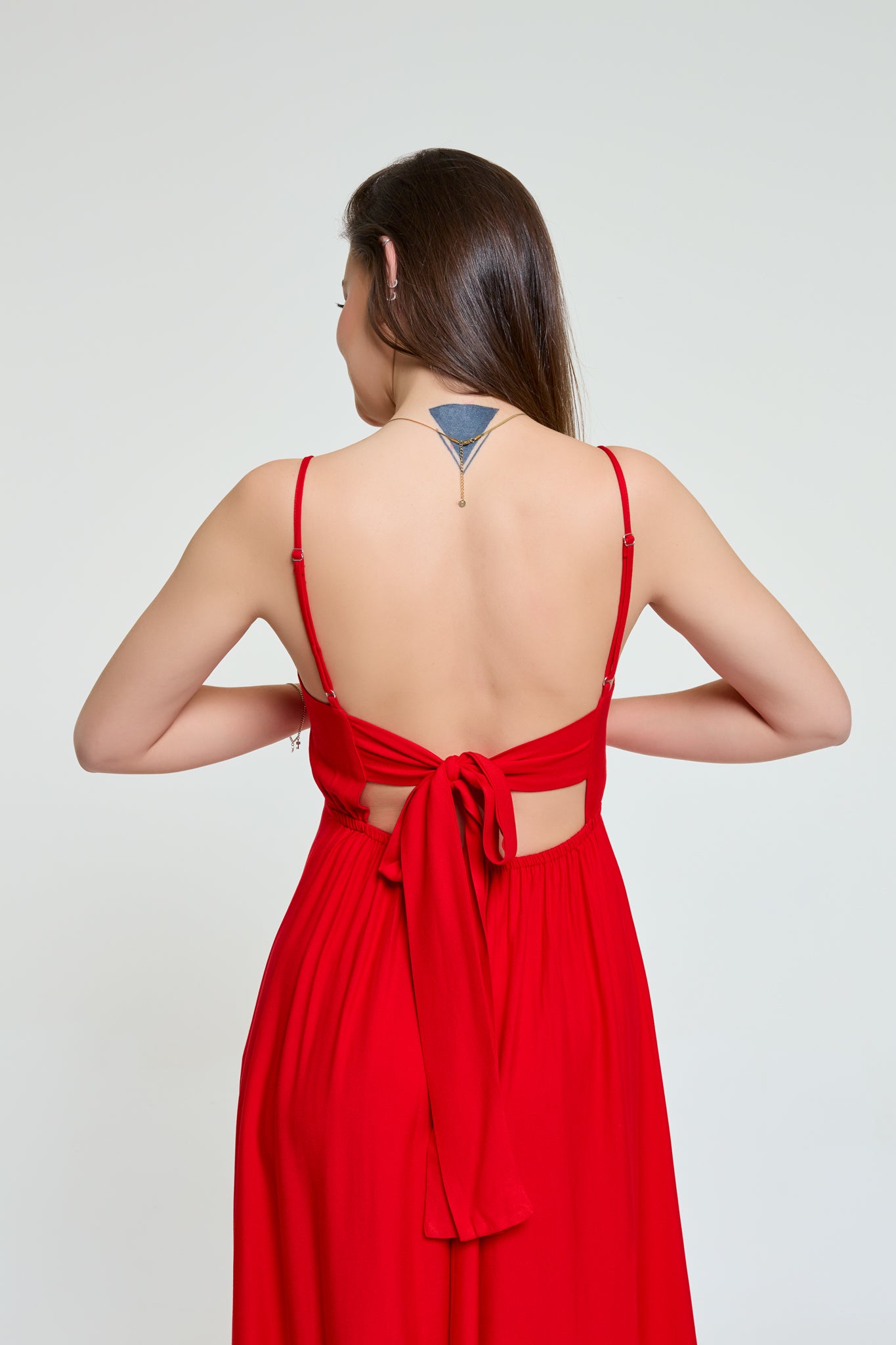 Back detail of Doris red dress with bow tie