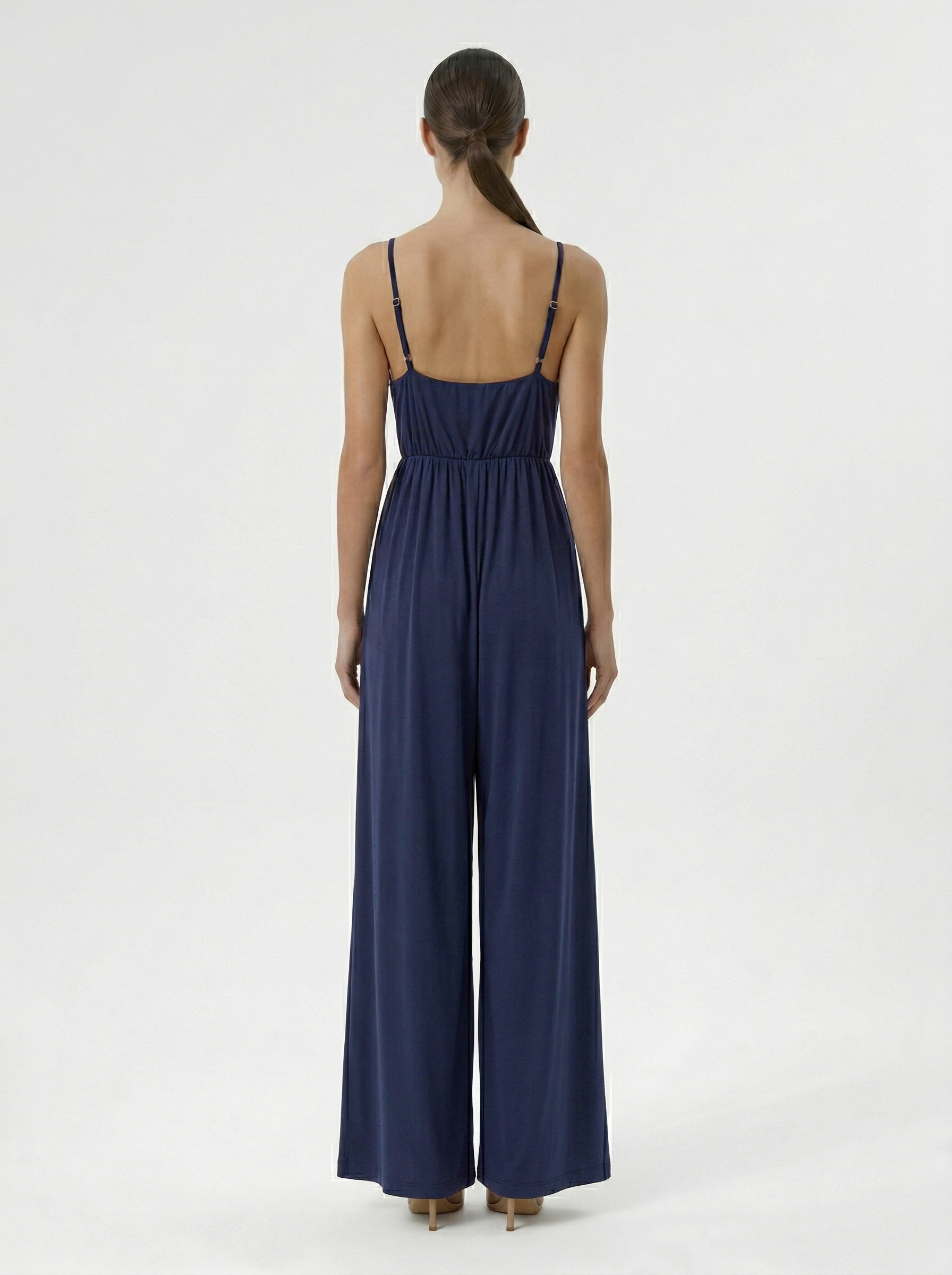Navy modal jumpsuit with adjustable straps and elastic waist back view