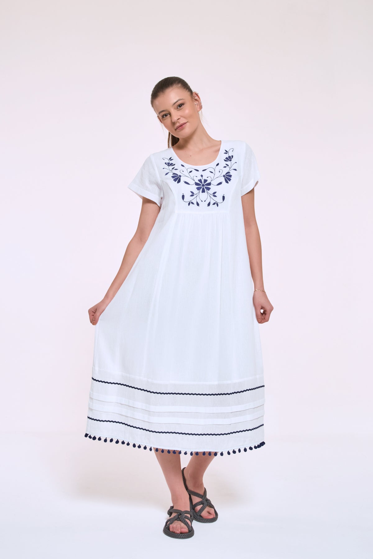 Didi white muslin cotton dress with delicate embroidery and breathable texture