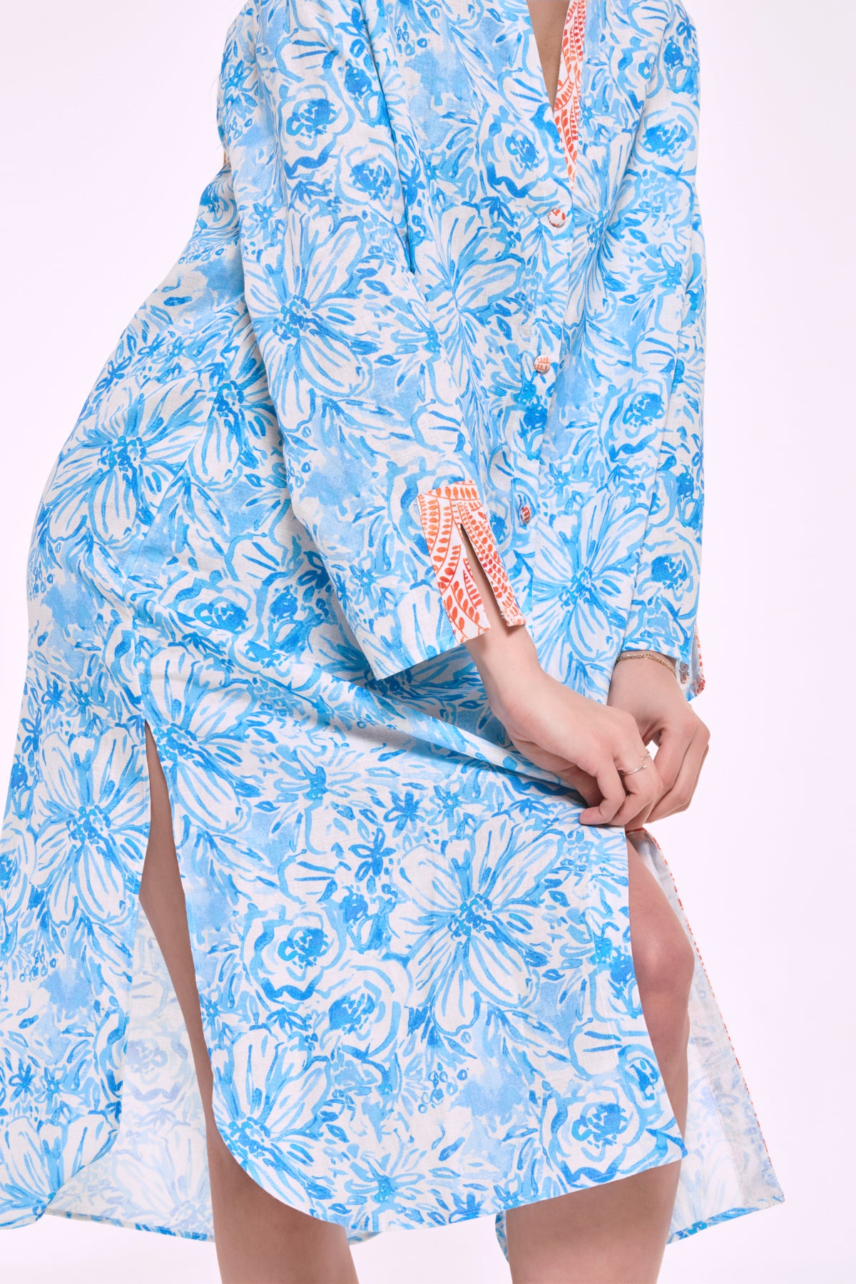 Side slit detail of Dina blue floral shirt dress